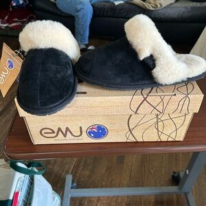 NWT and box Emu Black Suede Slippers with Cream Shearling Trim, women’s size 7